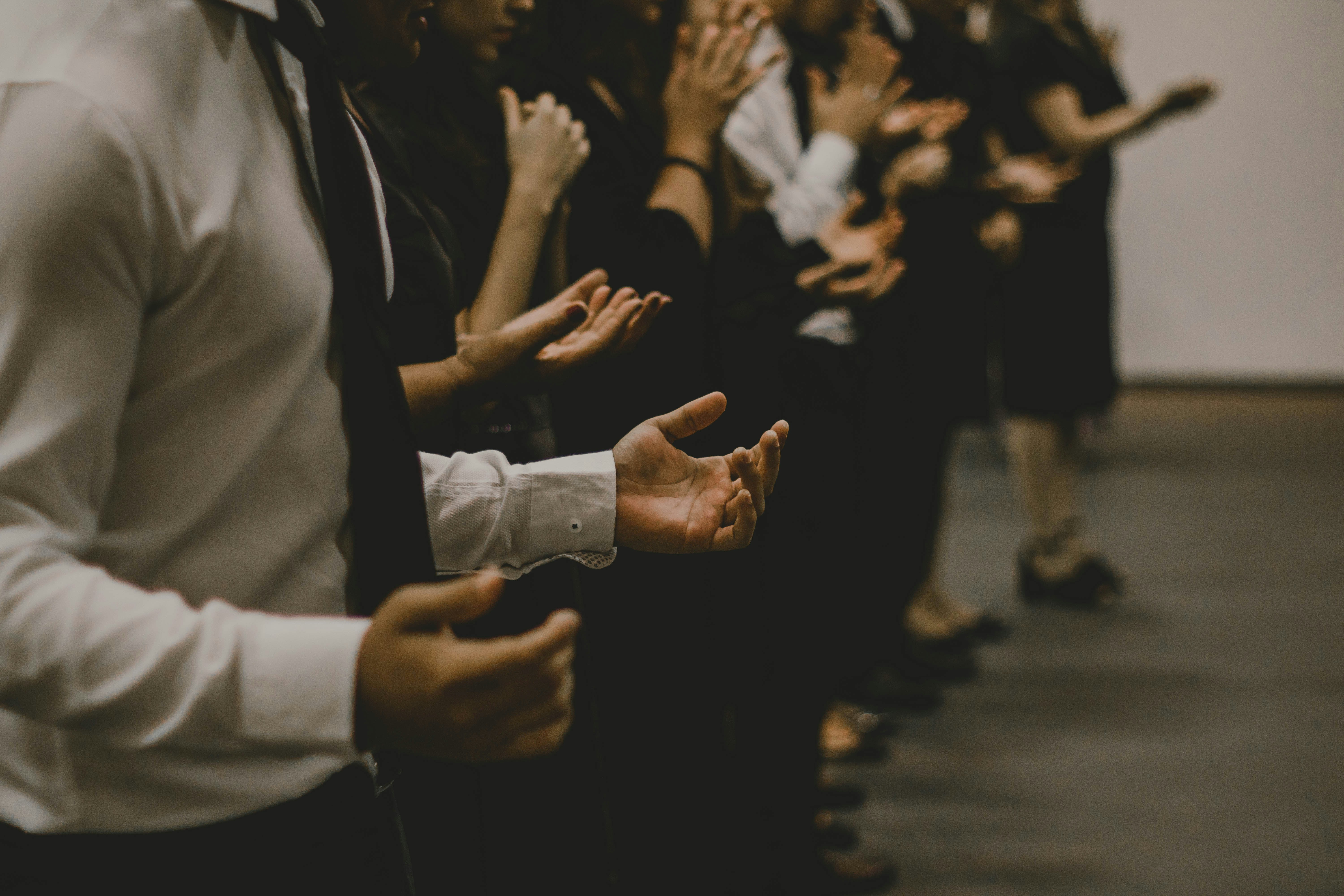 People praying together during worship